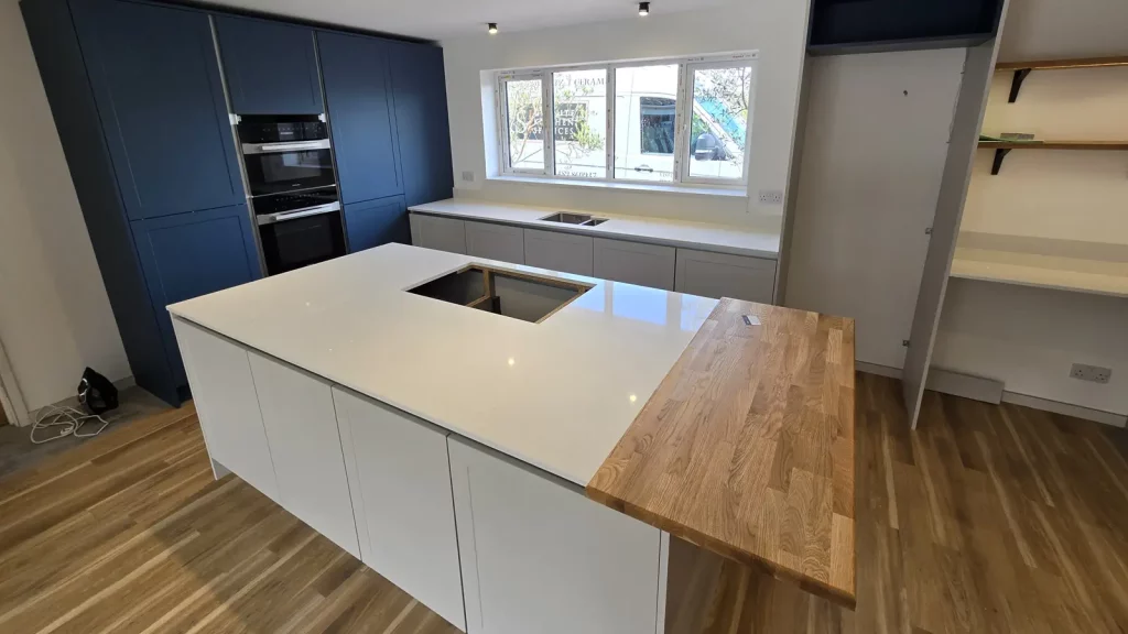 Kitchen with BQS white shimmer kitchen worktops