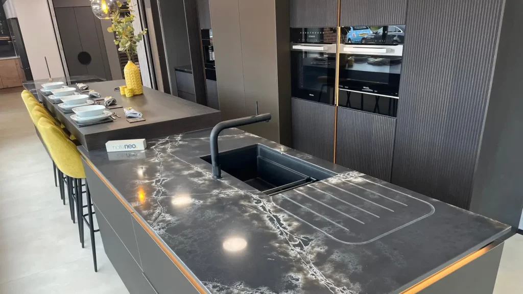 Kitchen with Compac Black Ice Quartz kitchen worktops